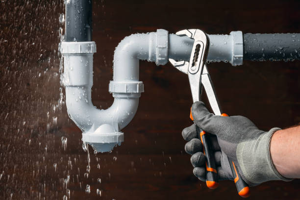 Professional Drain Cleaning technician working in Farley, MO